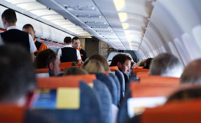 Passenger opens plane door `to get some fresh air`